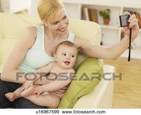 Mother Photographing Herself and Baby Boy View Large Photo Image Stock Photo - Mother Photographing Herself and Baby Boy. Fotosearch