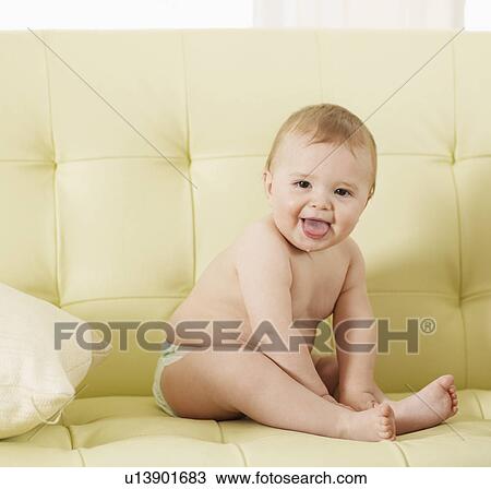 Portrait of Baby Boy Sitting on Sofa View Large Photo Image Stock Image - Portrait of Baby Boy Sitting on Sofa. Fotosearch