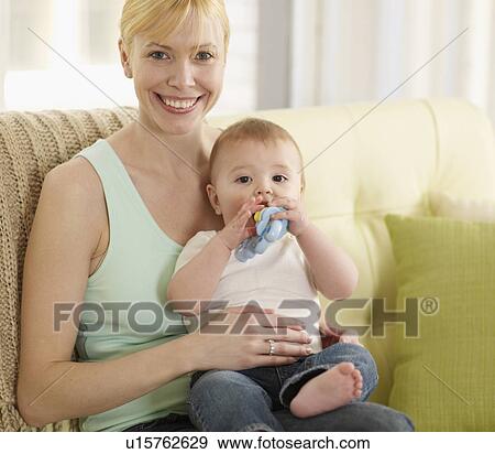 Stock Photo - Portrait of Mother and Baby Boy. Fotosearch