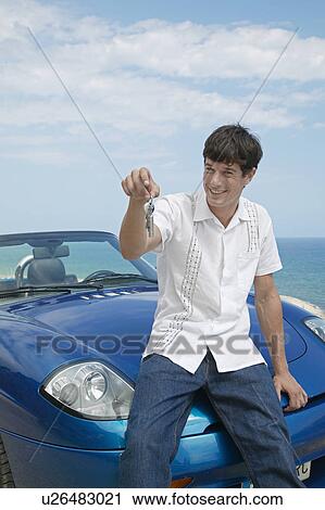 Mid-Adult Man Holding Car Keys View Large Photo Image Stock Image - Mid-Adult Man Holding Car Keys. Fotosearch