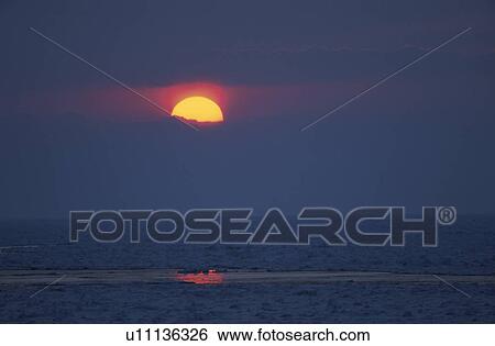 Drift Ice And The Setting Sun View Large Photo Image Stock Photograph - Drift Ice And The Setting Sun. Fotosearch
