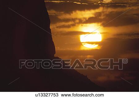 Stock Image - Setting Sun. Fotosearch