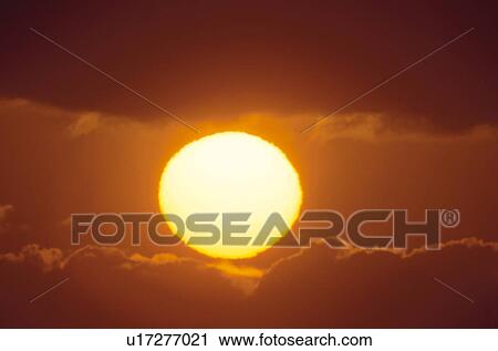 Stock Image - Setting Sun. Fotosearch