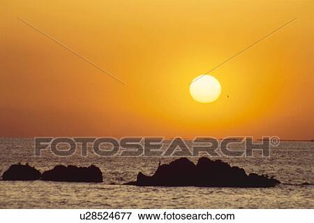 Stock Photo - Setting Sun. Fotosearch