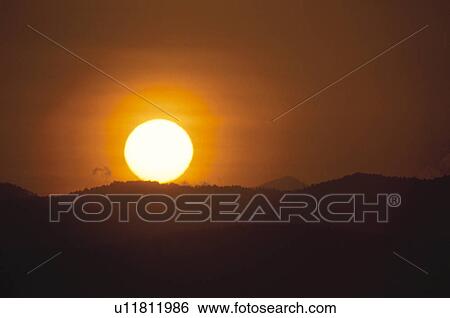 Stock Photograph - Setting Sun. Fotosearch