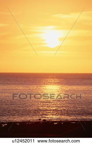 Sun Setting Over Ocean View Large Photo Image Stock Image - Sun Setting Over Ocean. Fotosearch