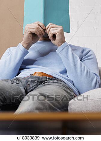 Mid Adult Man Reading Book View Large Photo Image Stock Photo - Mid Adult Man Reading Book. Fotosearch