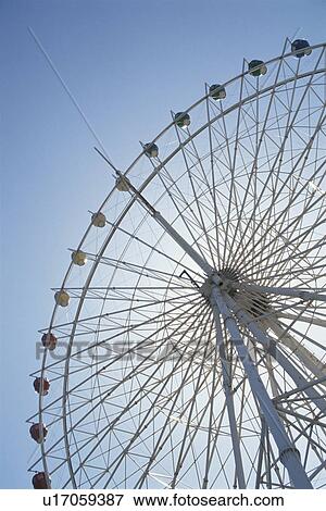 A Ferris Wheel And The Sky View Large Photo Image Stock Photo - A Ferris Wheel And The Sky. Fotosearch
