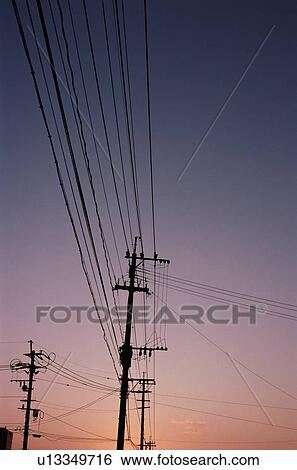 Silhouetted Utility Poles View Large Photo Image Stock Photograph - Silhouetted Utility Poles. Fotosearch
