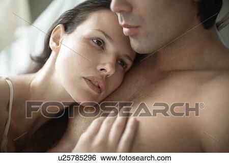 Woman resting head on man's chest View Large Photo Image Stock Photograph - Woman resting head on man's chest. Fotosearch