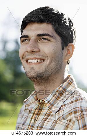 Stock Image - Portrait of young man. Fotosearch