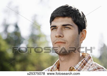 Portrait of young man View Large Photo Image Stock Photo - Portrait of young man. Fotosearch