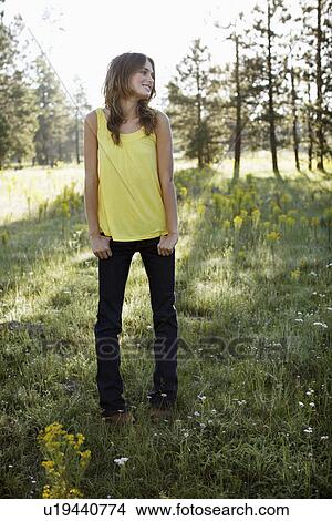 Young woman in woods View Large Photo Image Picture - Young woman in woods. Fotosearch