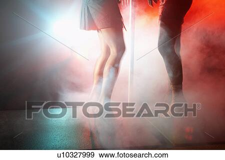 Two female dancers on stage (close-up) View Large Photo Image Stock Photo - Two female dancers on stage (close-up). Fotosearch