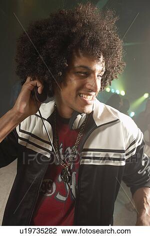 Stock Image - Young DJ. Fotosearch