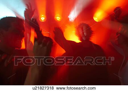 Young people clubbing (blurred motion) View Large Photo Image Stock Photo - Young people clubbing (blurred motion). Fotosearch