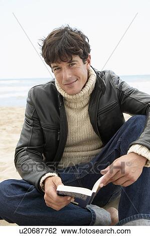 Mid-Adult Man Reading Book View Large Photo Image Stock Image - Mid-Adult Man Reading Book. Fotosearch