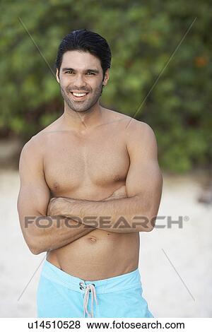 Portrait of shirtless young man View Large Photo Image Stock Photo - Portrait of shirtless young man. Fotosearch