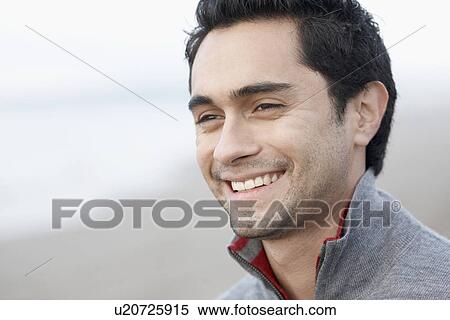 Young man smiling View Large Photo Image Stock Photography - Young man smiling. Fotosearch