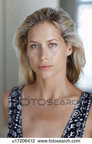 Mid adult woman with blond hair (portrait) View Large Photo Image Stock Image - Mid adult woman with blond hair (portrait). Fotosearch