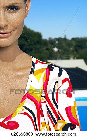 Stock Photo - Portrait of Young Woman in Dress. Fotosearch