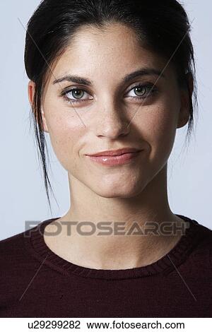 Stock Image - Portrait of young woman. Fotosearch