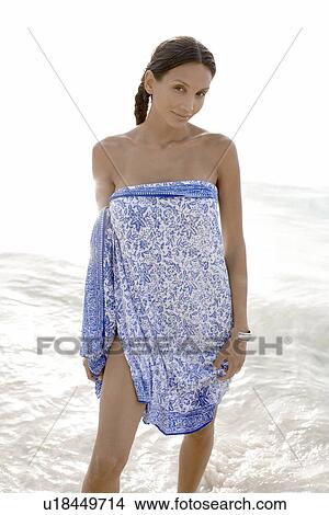 Young woman in sarong View Large Photo Image Picture - Young woman in sarong. Fotosearch