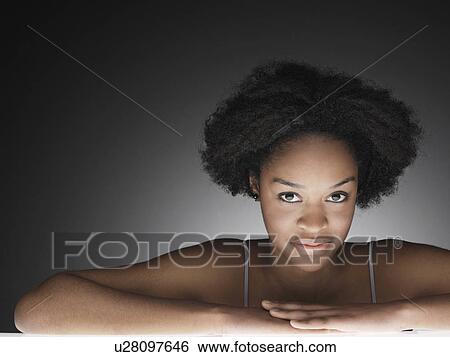 Stock Photograph - Young woman (portrait). Fotosearch