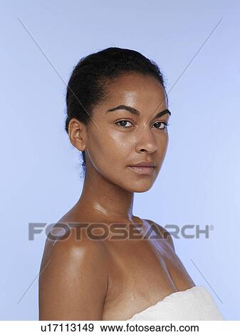 Young woman sweating View Large Photo Image Stock Photo - Young woman sweating. Fotosearch