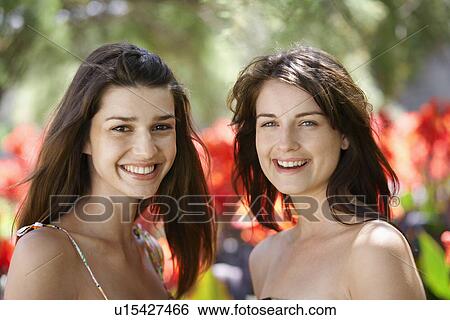 Stock Photograph - Portrait of two young women. Fotosearch