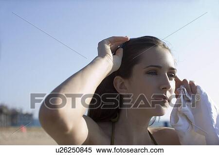 Young adult woman looking away, Side View, Differential Focus View Large Photo Image Stock Photography - Young adult woman looking away, Side View, Differential Focus. Fotosearch