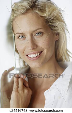 Mid adult woman with blond hair View Large Photo Image Stock Photo - Mid adult woman with blond hair. Fotosearch