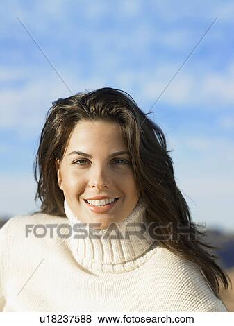 Young woman in turtleneck sweater, portrait View Large Photo Image Stock Photo - Young woman in turtleneck sweater, portrait. Fotosearch