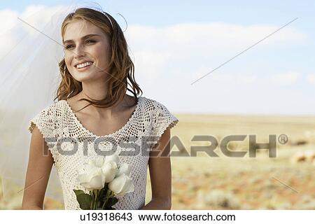 Stock Image - Bride in desert, Arizona, USA. Fotosearch