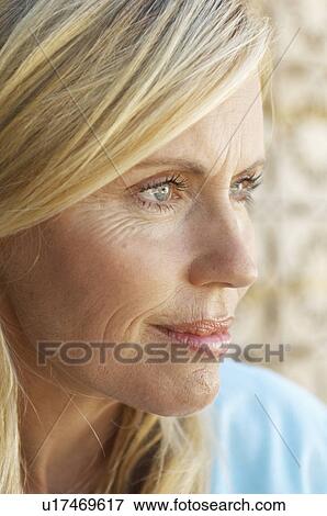 Mature woman with blond hair (portrait) View Large Photo Image Stock Photo - Mature woman with blond hair (portrait). Fotosearch