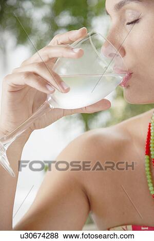 Stock Photo - Woman drinking water. Fotosearch