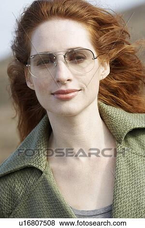 Stock Photo - Woman with sunglasses (portrait). Fotosearch