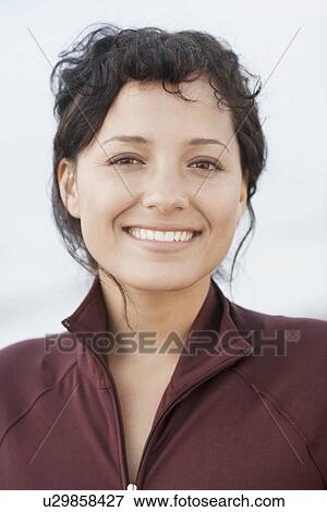 Young woman in tracksuit jacket (portrait) View Large Photo Image Stock Photo - Young woman in tracksuit jacket (portrait). Fotosearch