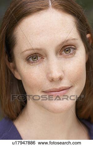 Stock Photograph - Young woman (portrait). Fotosearch