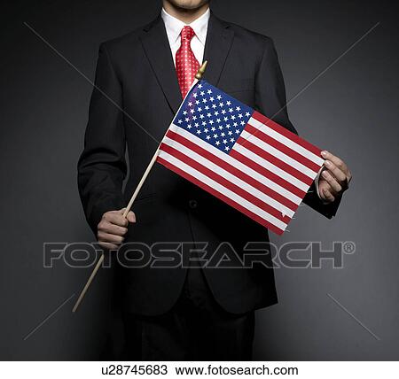 Businessman Holding American Flag View Large Photo Image Stock Image - Businessman Holding American Flag. Fotosearch
