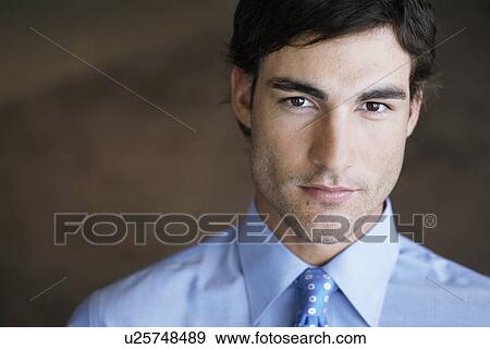 Stock Photo - Young businessman (portrait). Fotosearch