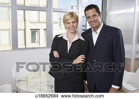 Businesswoman and businessman (portrait) View Large Photo Image Picture - Businesswoman and businessman (portrait). Fotosearch