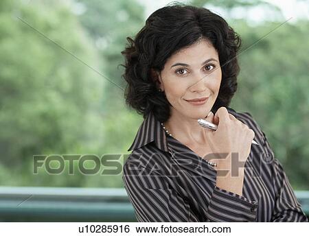 Businesswoman smiling (portrait) View Large Photo Image Stock Photograph - Businesswoman smiling (portrait). Fotosearch