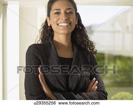 Stock Photograph - Businesswoman smiling (portrait). Fotosearch