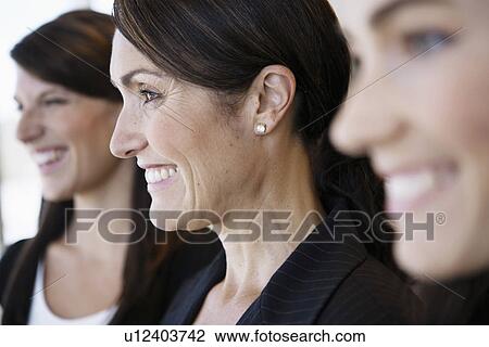 Three businesswomen View Large Photo Image Stock Image - Three businesswomen. Fotosearch