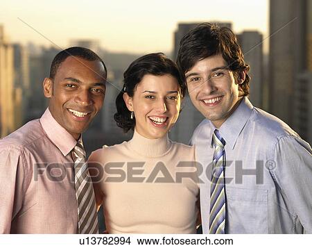 Three happy businesspeople (portrait) View Large Photo Image Picture - Three happy businesspeople (portrait). Fotosearch