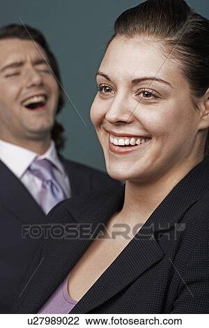 Two Businesspeople Laughing View Large Photo Image Stock Image - Two Businesspeople Laughing. Fotosearch