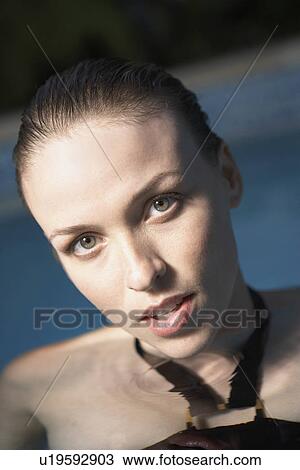 Young woman in water (portrait) View Large Photo Image Stock Image - Young woman in water (portrait). Fotosearch