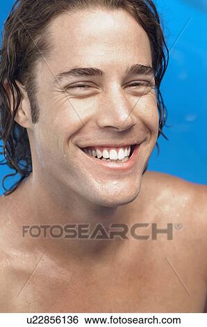 Shirtless young man laughing (portrait) View Large Photo Image Stock Photograph - Shirtless young man laughing (portrait). Fotosearch