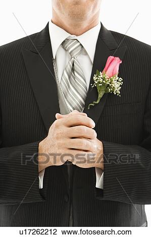 Close up of groom with clenched fists View Large Photo Image Stock Image - Close up of groom with clenched fists. Fotosearch